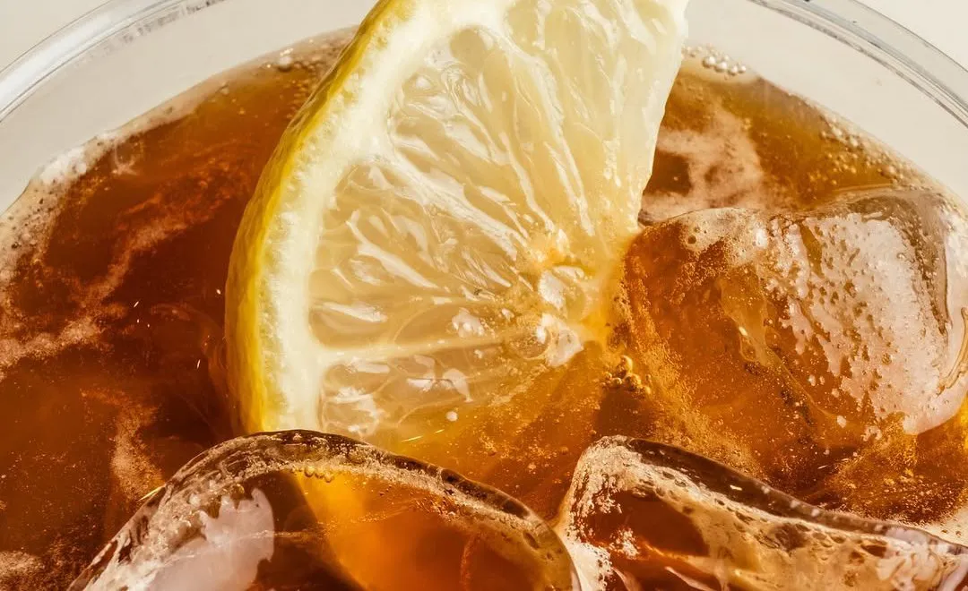 Close-up of Black Lemonade with lemon and ice